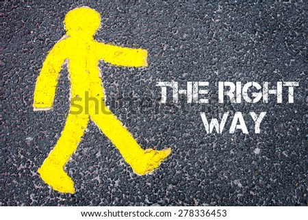 Yellow pedestrian figure on the road walking towards THE RIGHT WAY. Conceptual image with Text message over asphalt background.