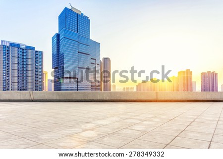 Empty floor and modern building with sunbeam