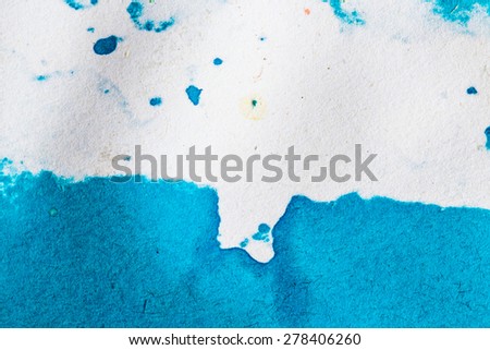 abstract watercolor background paper design of bright color splashes in  color  blue , modern art painted canvas of old faded vintage grunge background texture atmosphere