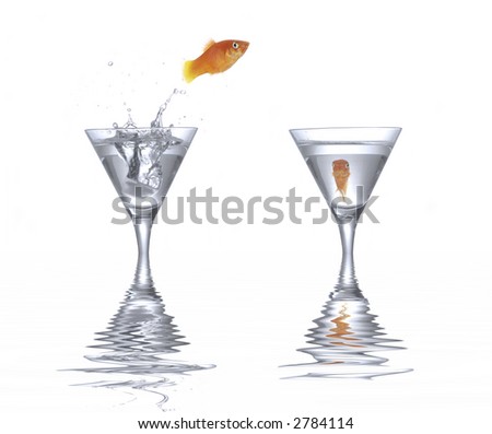 Goldfish is jumping. Picture was made in a  studio.