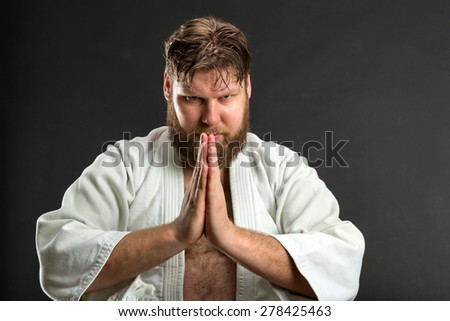 Karate fighter meditating