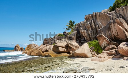 Large cobblestones and rocks, white sand, Seychelles