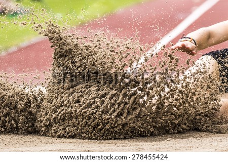 long jump in track and field Royalty-Free Stock Photo #278455424