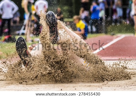 long jump in track and field Royalty-Free Stock Photo #278455430