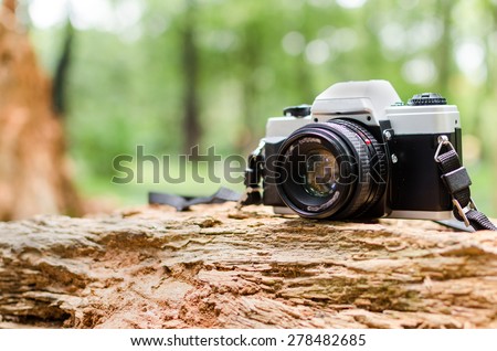 Film camera in natural outdoor, vintage look
