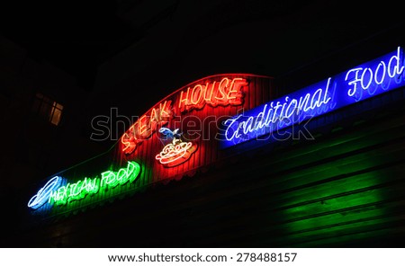 Neon shining signboard at night