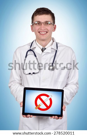 happy doctor holding tablet with no smoking on a blue background