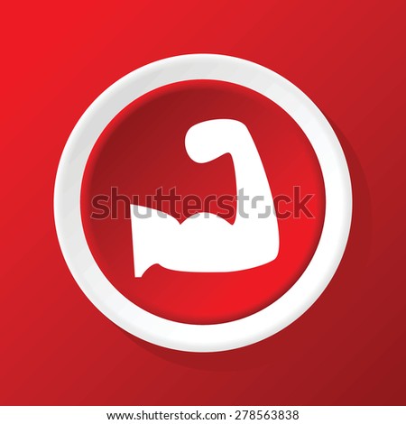 Round white icon with image of muscular arm, on red background