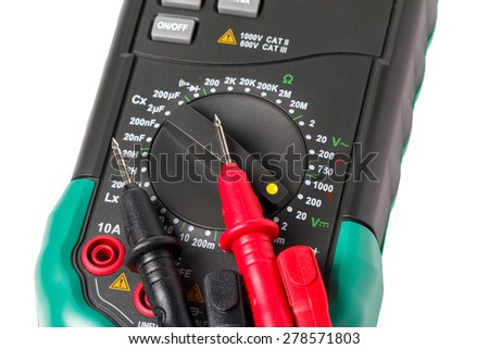 Multimeter with probes laying on top isolated on white 