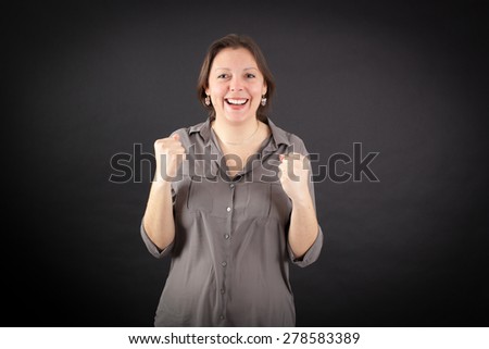 Beautiful woman doing different expressions in different sets of clothes: arms raised