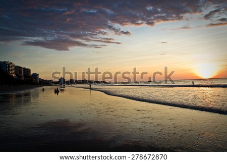 Beautiful clear sunset in touristic Murcielago beach, Manta, Ecuador Royalty-Free Stock Photo #278672870