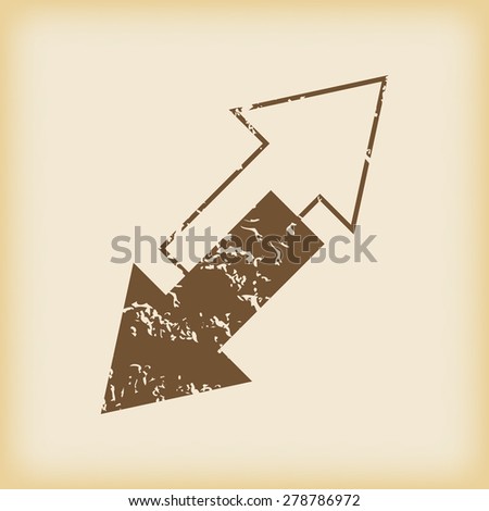 Grungy brown icon with image of two tilted opposite arrows, on beige background
