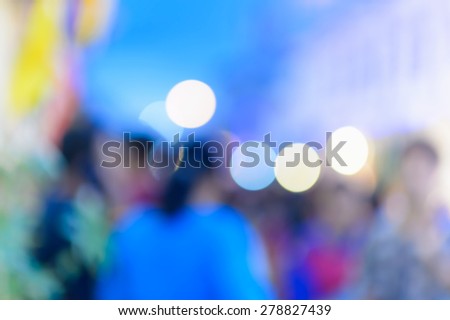 A crowd of people moving on the old town city night street defocused blurred abstract image at phuket thailand