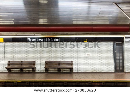NYC subway station and bench Royalty-Free Stock Photo #278853620