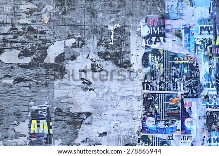 Old Plywood Billboard With Aged Torn Posters Background Texture With Copy Space