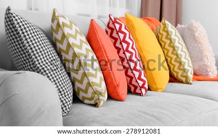 Sofa with colorful pillows in room Royalty-Free Stock Photo #278912081