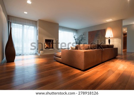 Spacious family room with wooden floor