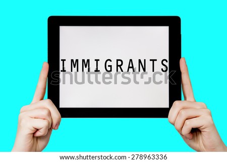 Tablet pc with text immigrants with blue background