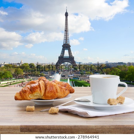 cup of coffee with croissant in Paris, France