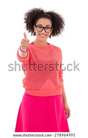 happy african american teenage girl in pink thumbs up isolated on white background