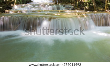 Beautiful blue stream water falls deep forest in national park of Thailand