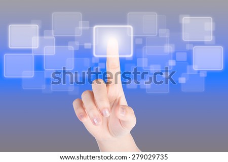 Hand pressing button with technology background