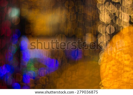 Artistic style - bokeh of lights in the background with blurring lights for your design, vintage or retro color tone