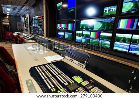 Remote control in a television studio Royalty-Free Stock Photo #279100400