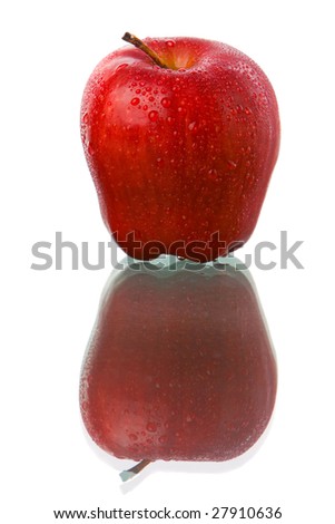 A red apple with much dew around it to enhance its freshness with reflection on glass table.
