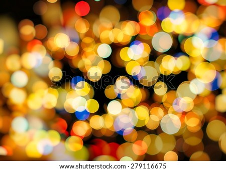 Festive Christmas background. Elegant abstract background with bokeh defocused lights and stars 
