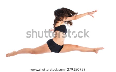 Young fitness female jumping
