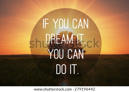 Motivational quote to make dreams came true on magical sunset with tree background