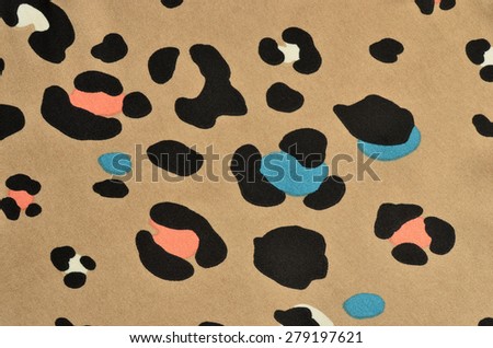 Brown leopard fur pattern. Colorful spotted animal print as background.