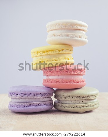 Colorful macarons with vintage pastel color tone.
