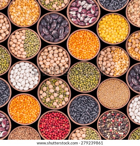Seamless texture with legumes on black background