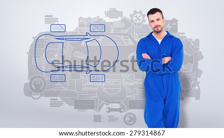 Mechanic standing arms crossed on white background against grey vignette