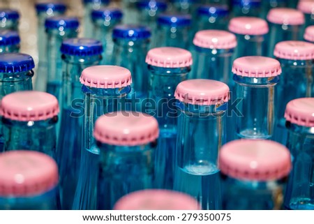 Lots of Mineral water glass bottles