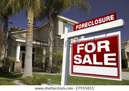 Foreclosure For Sale Real Estate Sign in Front of House.