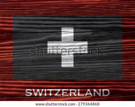 Flag of Switzerland on wooden background