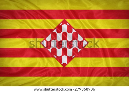 Girona flag on fabric texture,retro vintage style