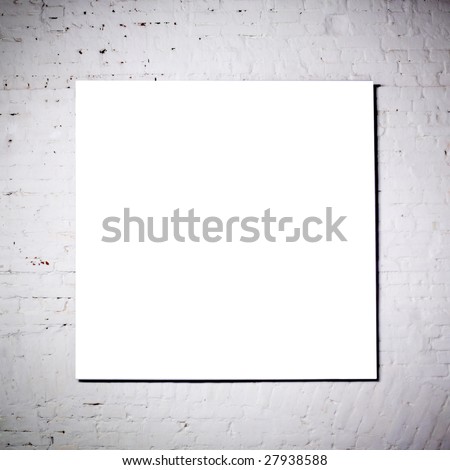 White frame on  white brick wall in museum