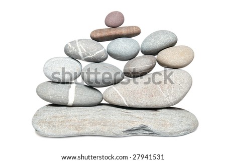 Wall of gray pebbles isolated on white