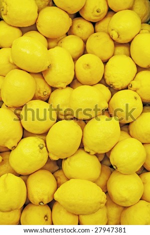 yellow background, texture of many lemons in market