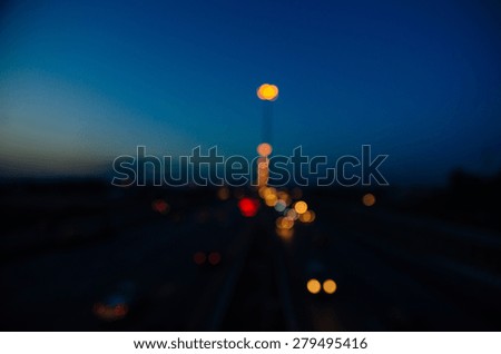 blur colorful lighhts traffic at twilight time abstract background
