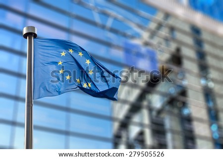 European Union flags in front of the blurred European Parliament in Brussels, Belgium Royalty-Free Stock Photo #279505526