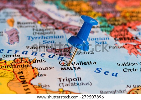 Map of Malta with a blue pushpin stuck Royalty-Free Stock Photo #279507896