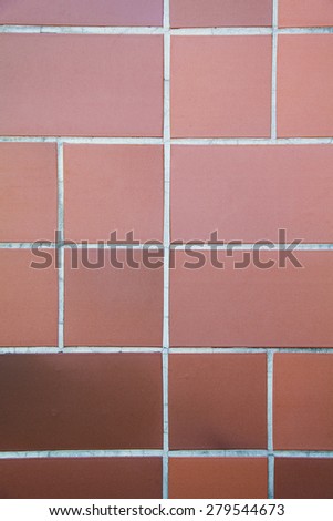 Real orange tile patern placed on the floor