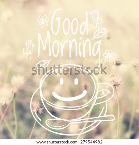 Good morning word on blurred flower with vintage filter background