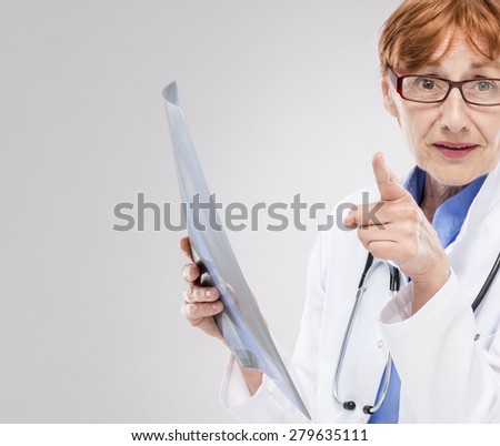 Sixty years woman doctor at work