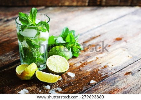 fresh mojito on a rustic table Royalty-Free Stock Photo #279693860